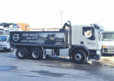 A semi trailer tipper features large format printed sign for advertising on the tippers side