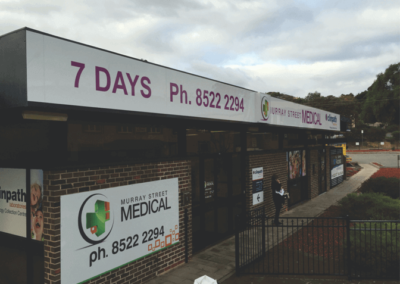 Three different types of vinyl lettering outside signs offering different types of information
