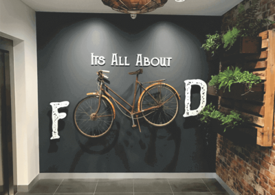Very innovative foyer area sign incorporating a bicycle and 3 D lettering