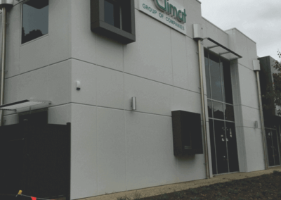 An outside 3D sign mounted on the side of a building