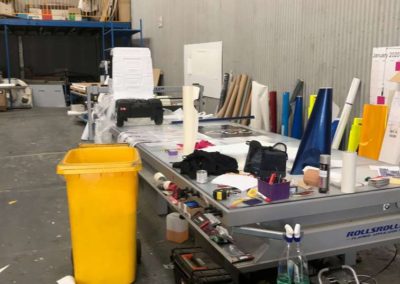 Long signage work benches have been designed and built for large signs to be easy to work on